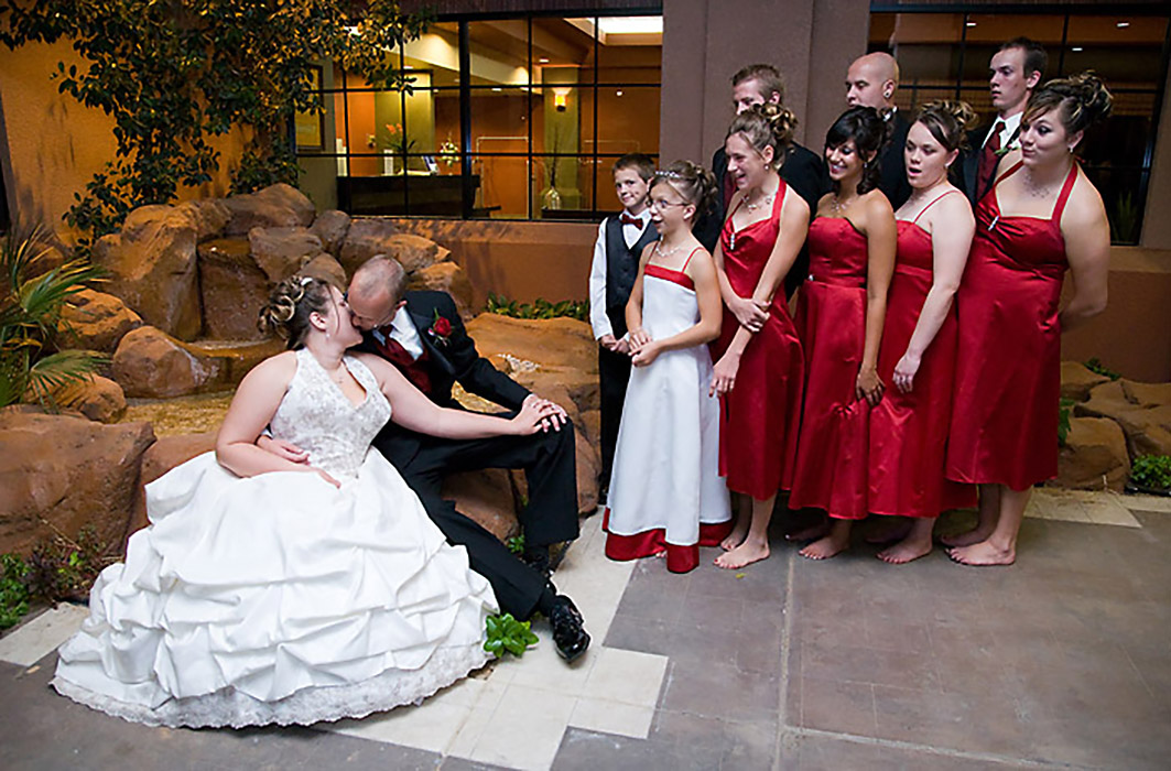 Bride and groom kissing